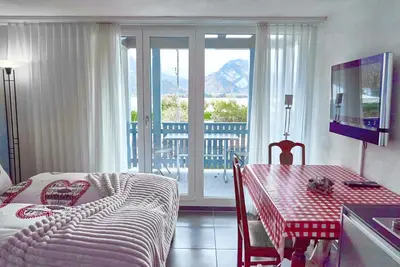 Ein Bett oder Betten in einem Zimmer der Unterkunft Lake apartment by Interlaken