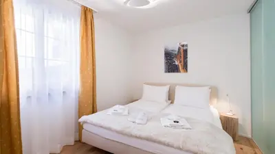 Ein Bett oder Betten in einem Zimmer der Unterkunft Panoramapark Soleil F