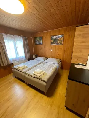 Ein Bett oder Betten in einem Zimmer der Unterkunft Pension Balm