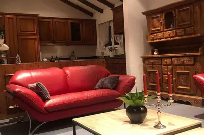 Ein Sitzbereich in der Unterkunft Charmjl, Haus Granit, 6 Personen