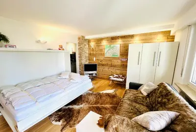 Ein Bett oder Betten in einem Zimmer der Unterkunft Chalet-Studio Europe 7