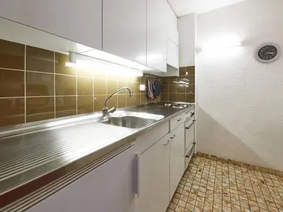 Küche/Küchenzeile in der Unterkunft Apartment Arzinol 305 by Interhome