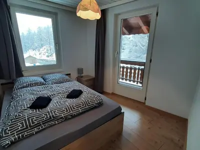 Ein Bett oder Betten in einem Zimmer der Unterkunft Apartment Alpin Smile by Interhome