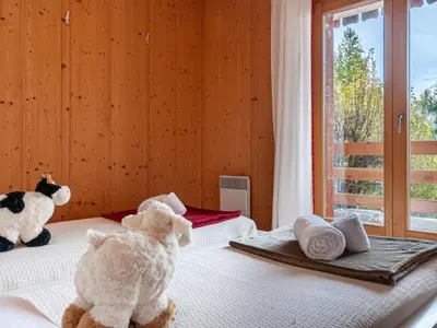 Ein Bett oder Betten in einem Zimmer der Unterkunft Chalet Sneachta by Interhome