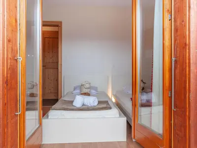 Ein Bett oder Betten in einem Zimmer der Unterkunft Chalet Sneachta by Interhome