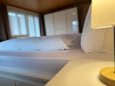 Ein Bett oder Betten in einem Zimmer der Unterkunft Swiss Apartment Thunersee