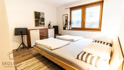 Ein Bett oder Betten in einem Zimmer der Unterkunft Haus Enzian, Blitzingen