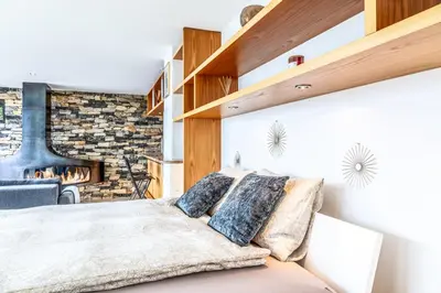 Ein Bett oder Betten in einem Zimmer der Unterkunft Loft Savièse