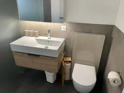 Ein Badezimmer in der Unterkunft Apartment Lauber, Haus Wichje A, Zermatt