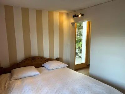Ein Bett oder Betten in einem Zimmer der Unterkunft Les Trembles MOUNTAIN & QUIET chalet 12 pers