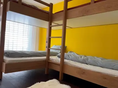Ein Bett oder Betten in einem Zimmer der Unterkunft Perla Garden, stylish apartment
