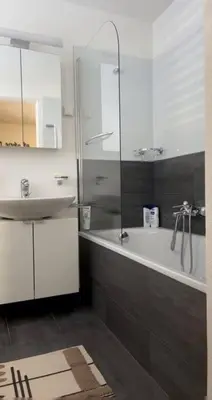 Ein Badezimmer in der Unterkunft Perla Garden, stylish apartment