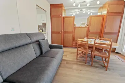 Ein Sitzbereich in der Unterkunft Logement avec vue époustouflante sur les montagnes
