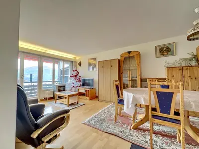 Ein Sitzbereich in der Unterkunft Appartement Nour