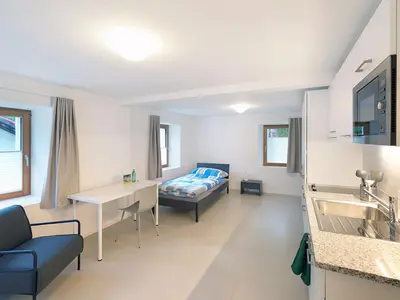 Ein Bett oder Betten in einem Zimmer der Unterkunft Casa degli Artisti