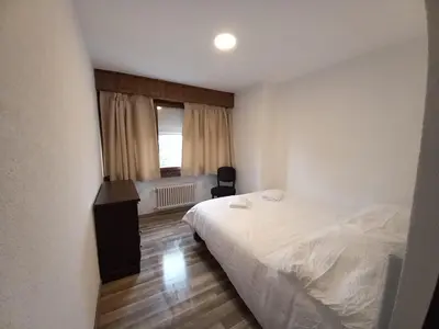 Ein Bett oder Betten in einem Zimmer der Unterkunft Auberge de l'Ours