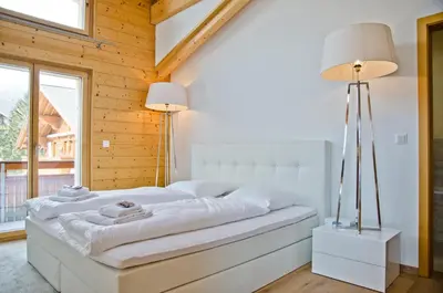 Ein Bett oder Betten in einem Zimmer der Unterkunft Apartment Silbersee - GRIWA RENT AG