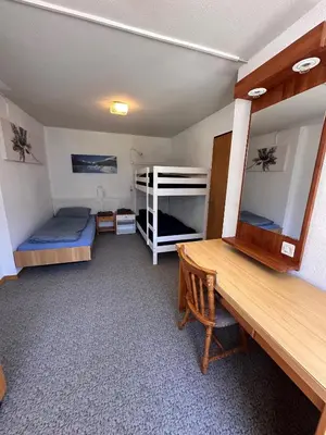 Ein Bett oder Betten in einem Zimmer der Unterkunft Swiss Paradise 7 Gaste und Nadelhorn 6 Gaste, Sauna
