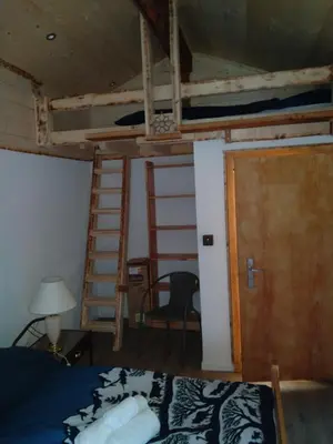 Ein Bett oder Betten in einem Zimmer der Unterkunft Chalet Bärgstäger