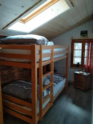 Ein Bett oder Betten in einem Zimmer der Unterkunft Chalet Bärgstäger