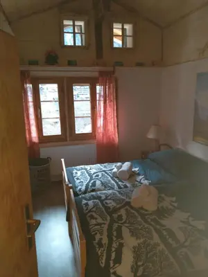 Ein Bett oder Betten in einem Zimmer der Unterkunft Chalet Bärgstäger