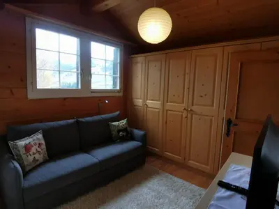 Ein Sitzbereich in der Unterkunft Appartement de vacances à Zweisimmen
