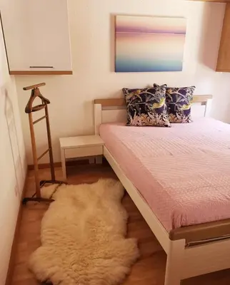 Ein Bett oder Betten in einem Zimmer der Unterkunft Appartement de vacances à Zweisimmen