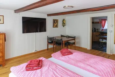 Ein Bett oder Betten in einem Zimmer der Unterkunft Charming Alpine Retreat by Apartments Capricorn