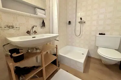Ein Badezimmer in der Unterkunft Charming studio, Bettmerhorn view