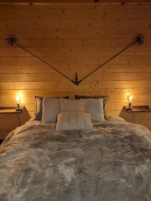 Ein Bett oder Betten in einem Zimmer der Unterkunft Chalet Adler