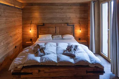 Ein Bett oder Betten in einem Zimmer der Unterkunft Chalet Adler