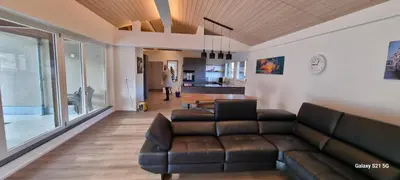 Ein Sitzbereich in der Unterkunft Mountain - Lake Apartement 1