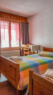 Ein Bett oder Betten in einem Zimmer der Unterkunft Hotel Restaurant Monte Leone