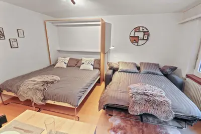 Ein Bett oder Betten in einem Zimmer der Unterkunft Chaleureux studio plein centre