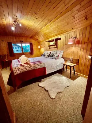 Ein Bett oder Betten in einem Zimmer der Unterkunft Chalet atypique Colorado Crans-Montana