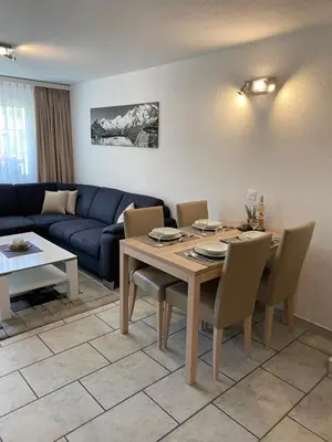 Ein Sitzbereich in der Unterkunft Apartments Arcadia