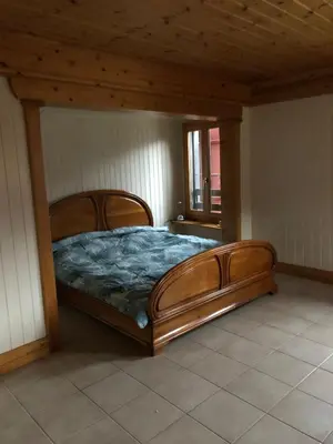 Ein Bett oder Betten in einem Zimmer der Unterkunft Chalet Crans-Montana