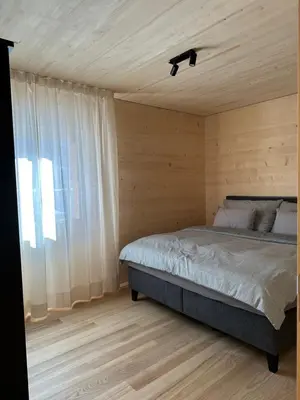Ein Bett oder Betten in einem Zimmer der Unterkunft Mondholz Ferienwohnung