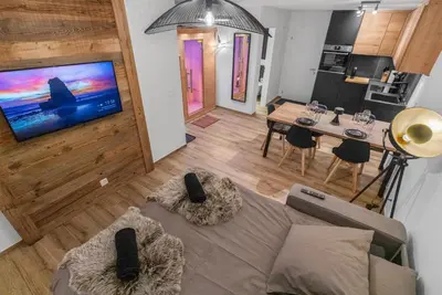 TV/Unterhaltungsangebot in der Unterkunft Appartement rénové avec vue panoramique et sauna