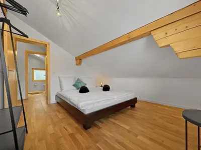 Ein Bett oder Betten in einem Zimmer der Unterkunft The Laughing Cow - 10 mns from Sion and ski