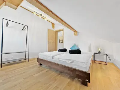 Ein Bett oder Betten in einem Zimmer der Unterkunft The Laughing Cow - 10 mns from Sion and ski