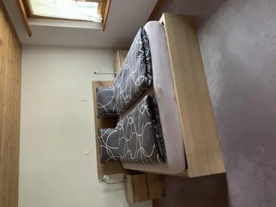 Ein Bett oder Betten in einem Zimmer der Unterkunft Apartment Alpenglühn by Interhome