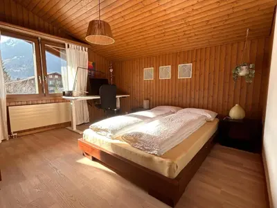 Ein Bett oder Betten in einem Zimmer der Unterkunft Apartment Chalet Ilge by Interhome