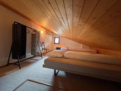 Ein Bett oder Betten in einem Zimmer der Unterkunft Apartment Chalet Ilge by Interhome