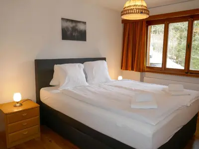 Ein Bett oder Betten in einem Zimmer der Unterkunft Apartment Chalet uf Duft by Interhome