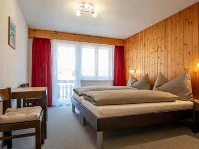 Ein Bett oder Betten in einem Zimmer der Unterkunft Apartment Haus Azur by Interhome