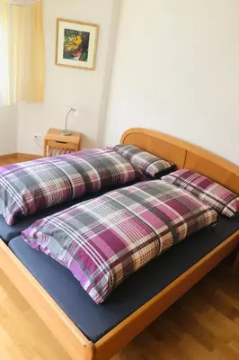 Ein Bett oder Betten in einem Zimmer der Unterkunft Apartment Edelweiss A-4 by Interhome