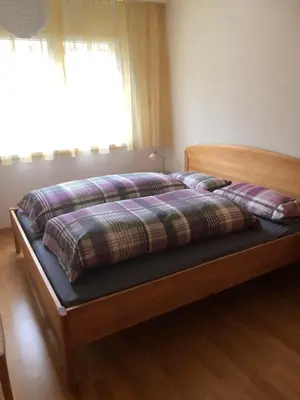 Ein Bett oder Betten in einem Zimmer der Unterkunft Apartment Edelweiss A-4 by Interhome
