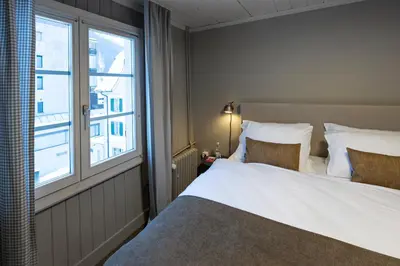 Ein Bett oder Betten in einem Zimmer der Unterkunft Hotel Bergidyll - Riders Haven