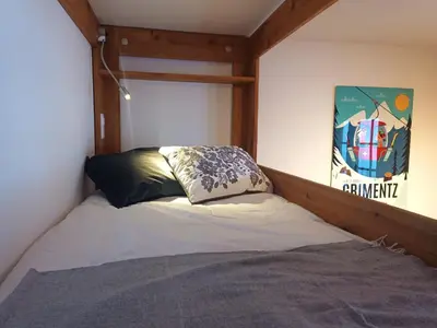Ein Bett oder Betten in einem Zimmer der Unterkunft Agréable appartement à Grimentz, au pied des pistes